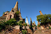 Inle Lake Myanmar. Indein, a cluster of ancient stupas  ruined and overgrown with bushes, just behind the village. 